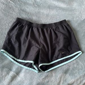 nike black and blue trim running short